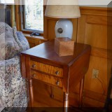 F22. Drop-leaf side table with two tiger maple faced drawers.